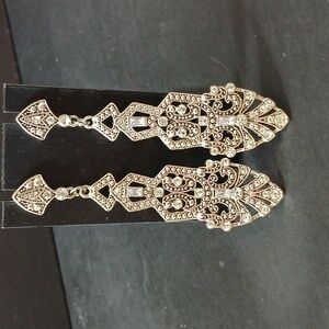 Silver tone Rhine stone dangling earrings